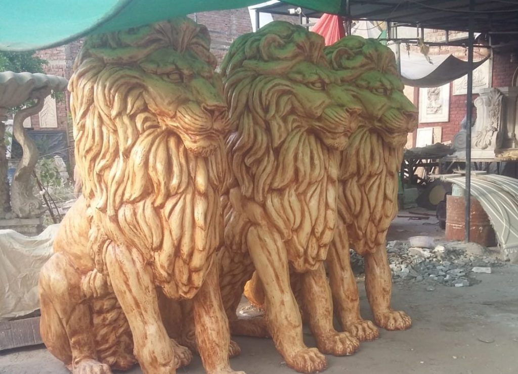 lion bass sculptures